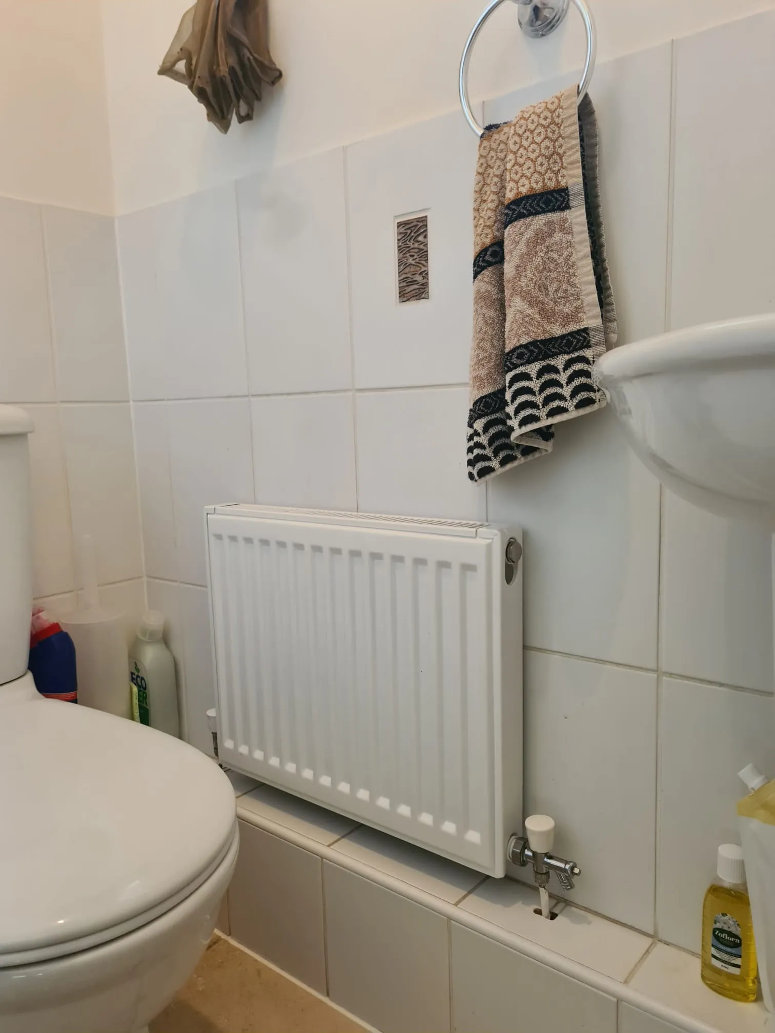 towel hanging on a towel rack in a bathroom